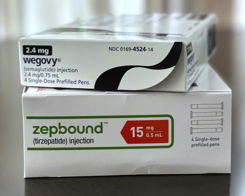 FILE - Boxes for the medications Wegovy and Zepbound are arranged for a photograph in California on May 8, 2025. (AP Photo/JoNel Aleccia, file)